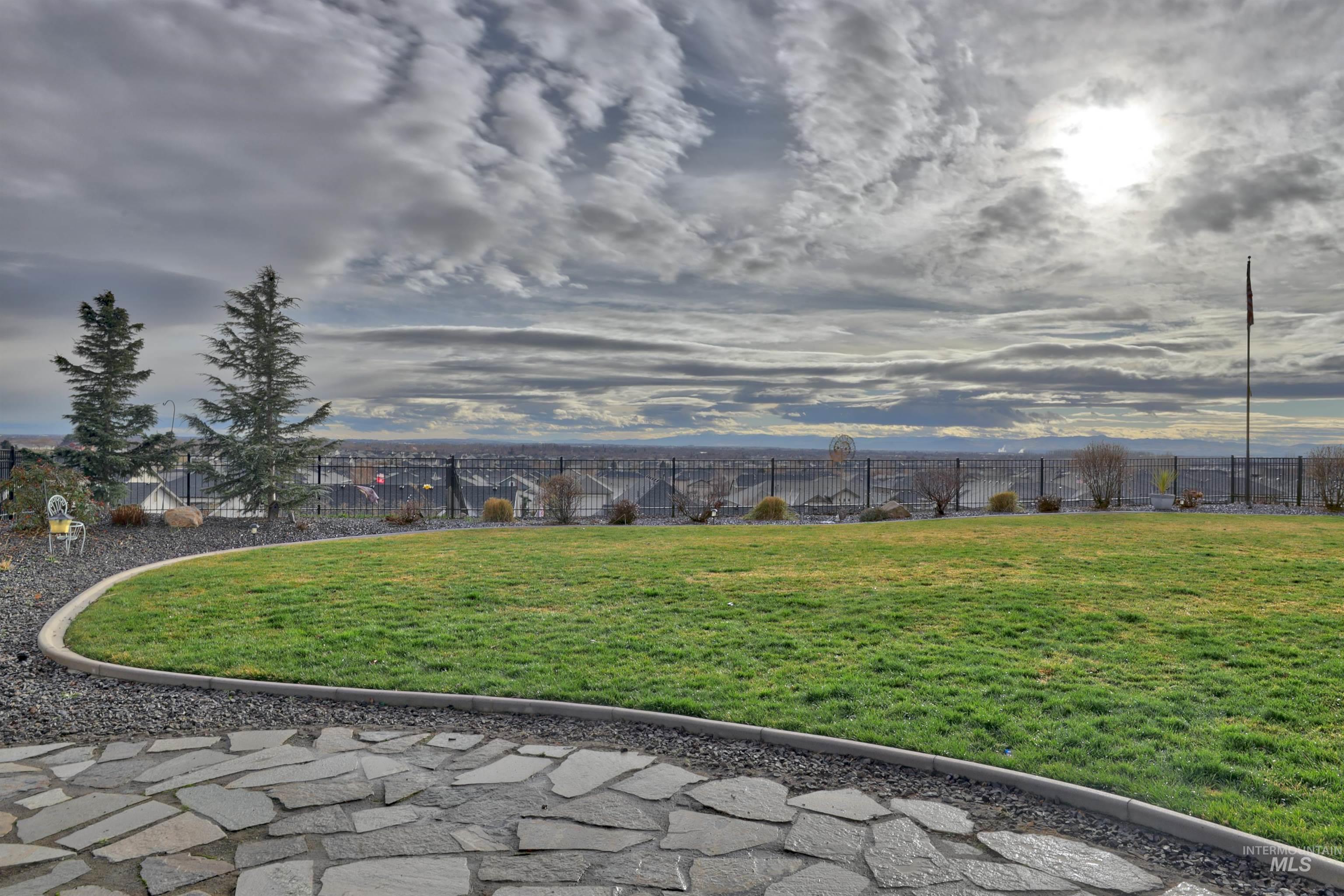 View of fenced backyard