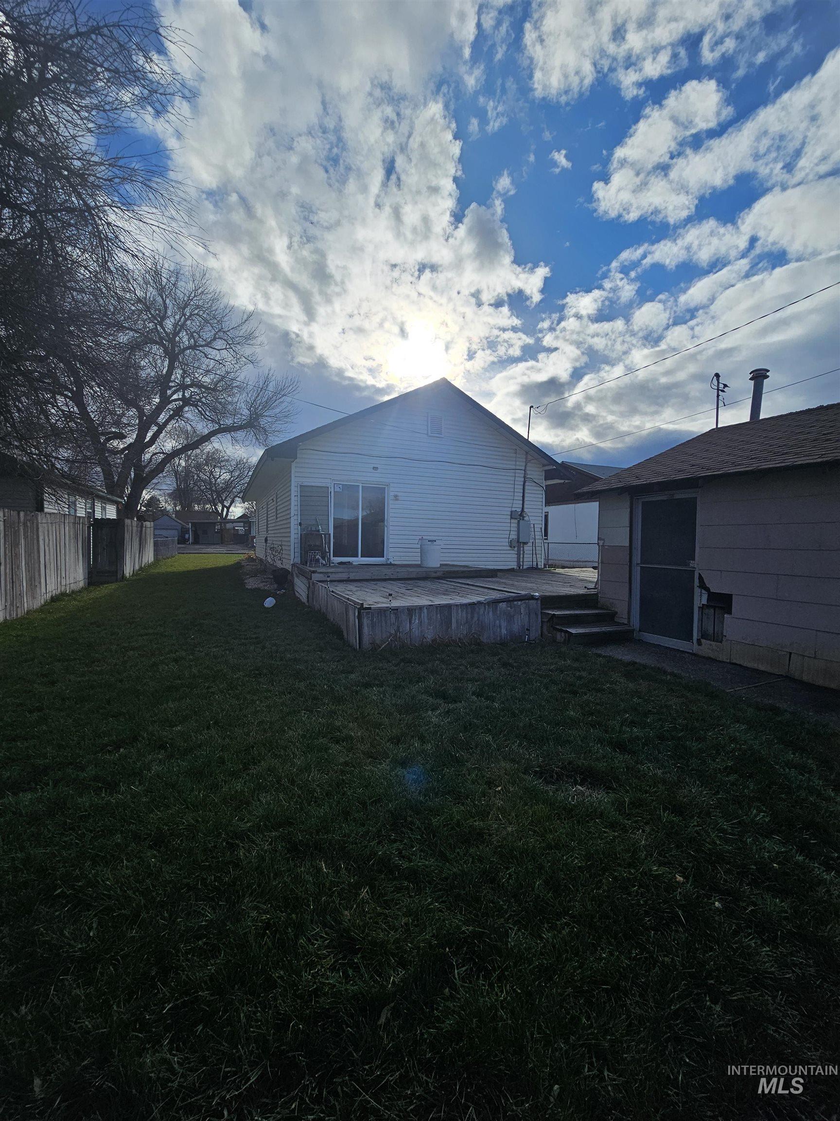 Rear view of house with a patio