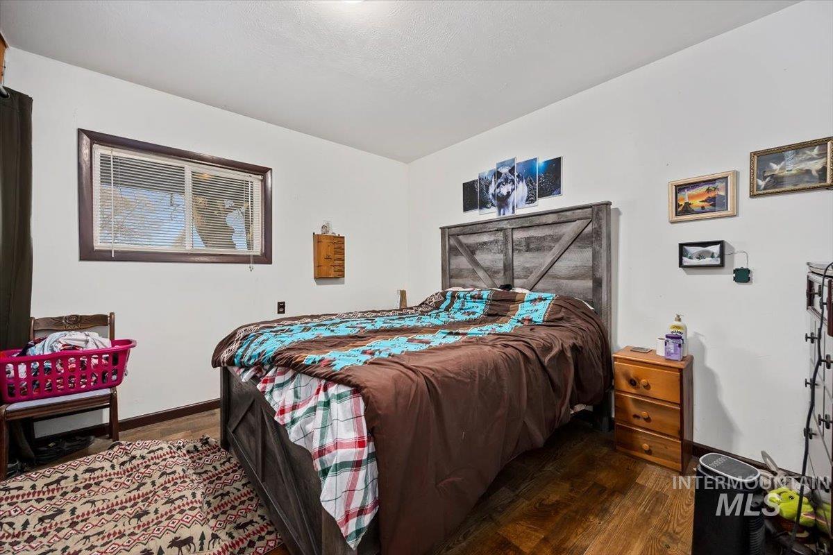 Bedroom with wood finished floors