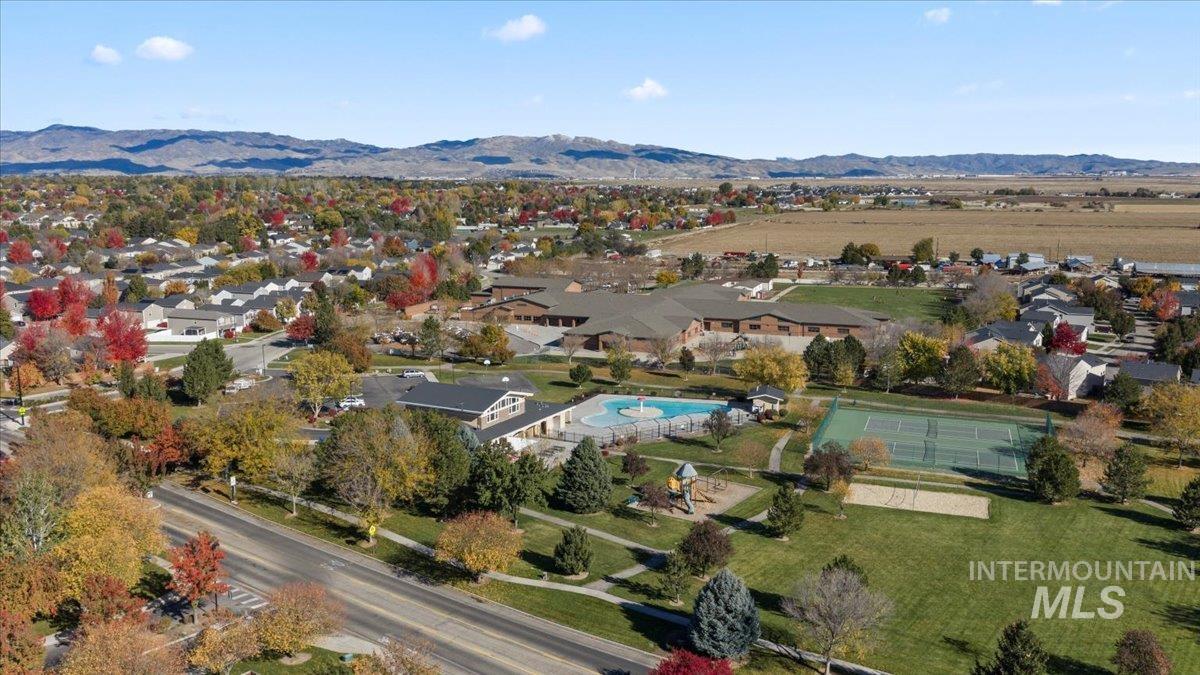 Aerial view of residential area with a mountain backdrop