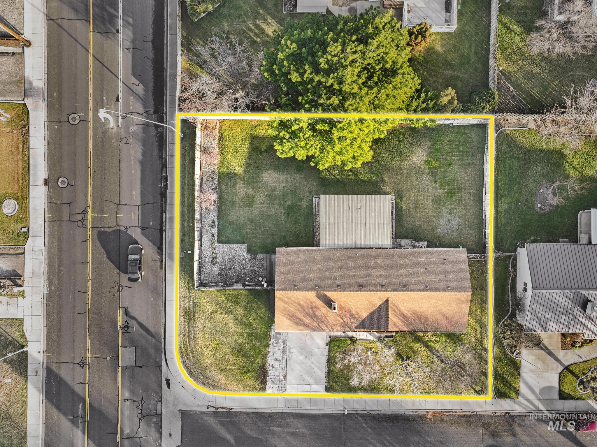 Aerial overview of property's location with property parcel outlined