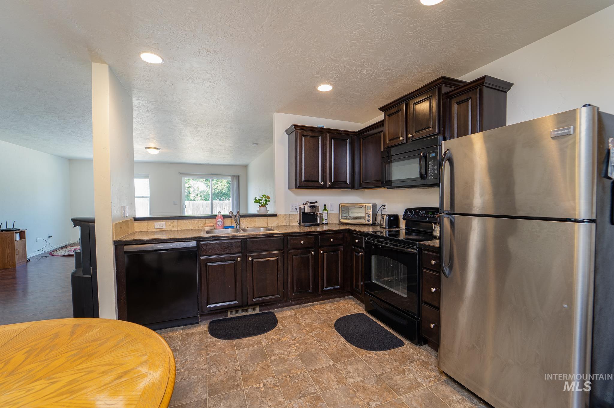 9574 W Stonewood Drive, Boise, Idaho 83709, 3 Bedrooms, 2 Bathrooms, Residential For Sale, Price $395,000, 98970983