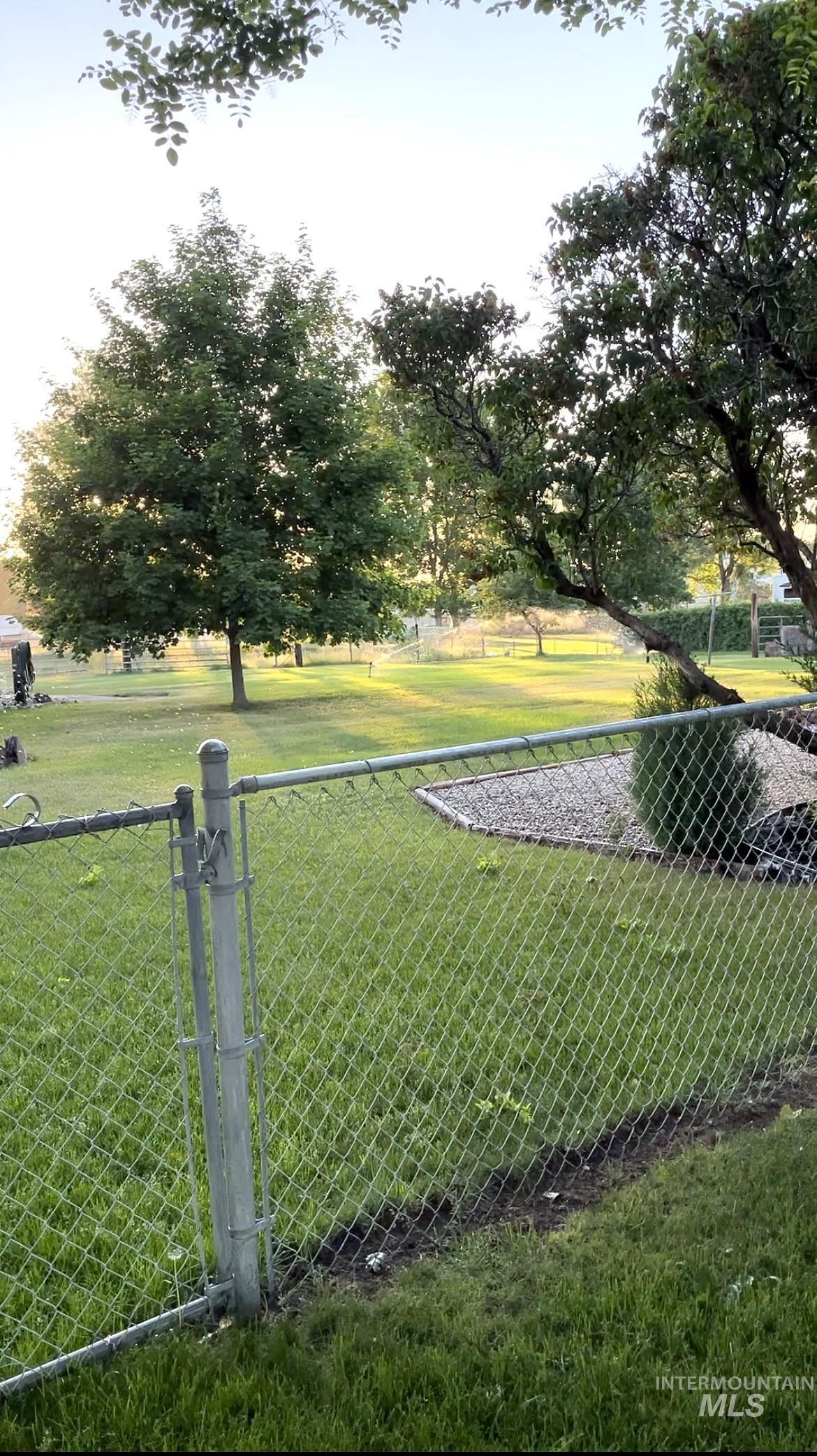 View of yard with a gate