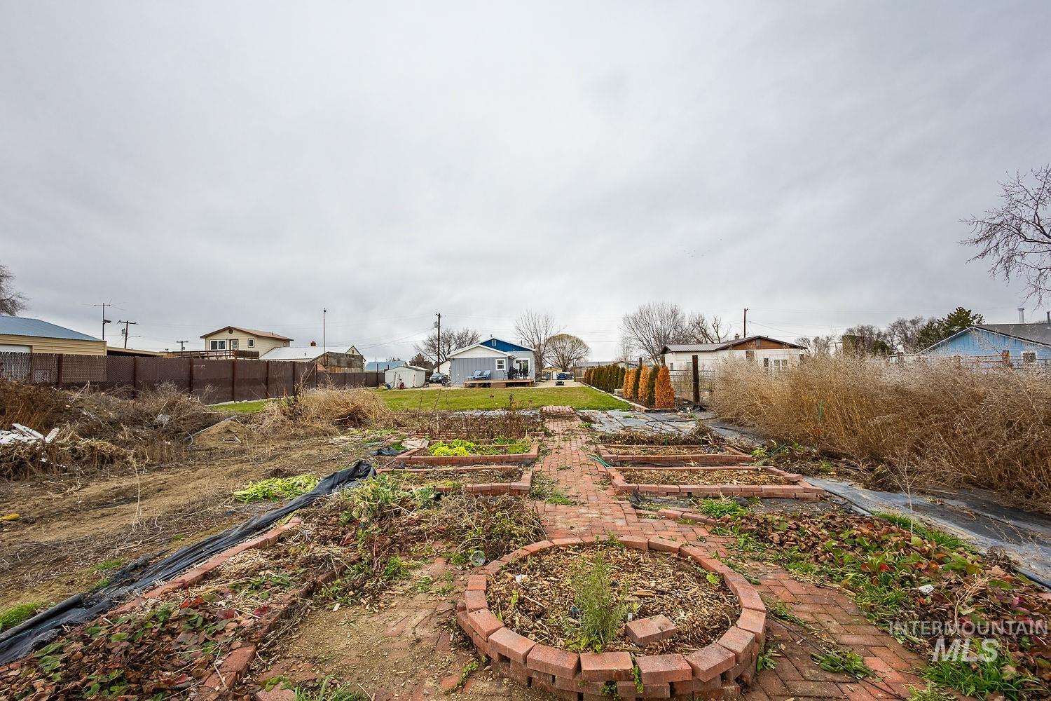 View of yard featuring a vegetable garden