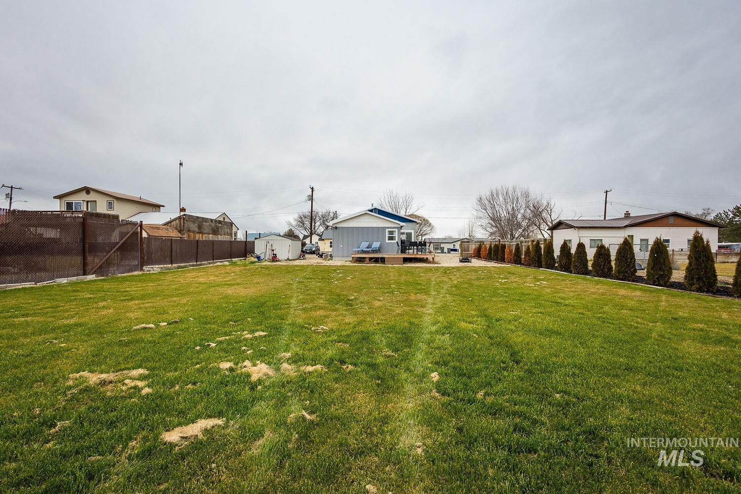 View of fenced backyard
