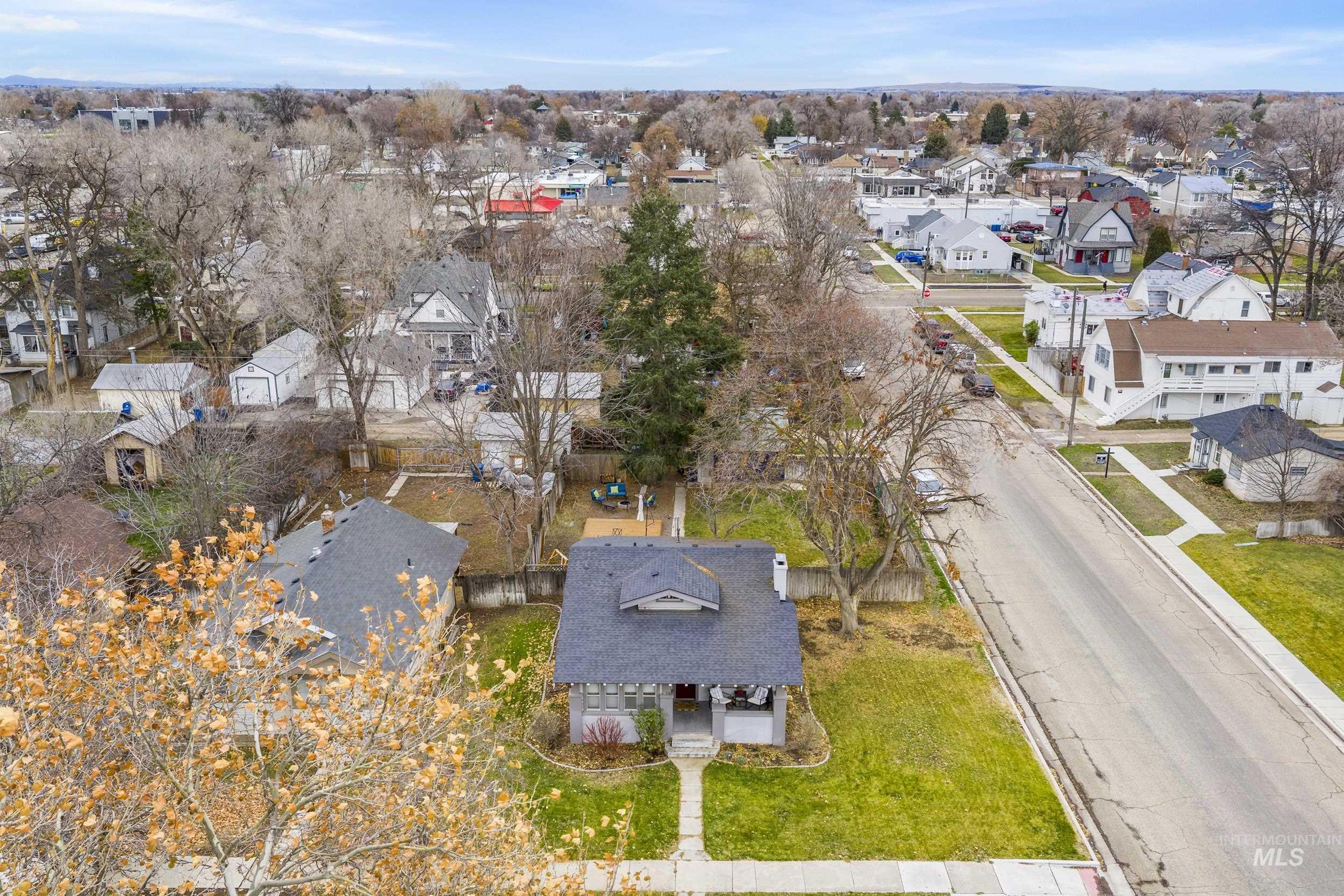 View of property location with nearby suburban area