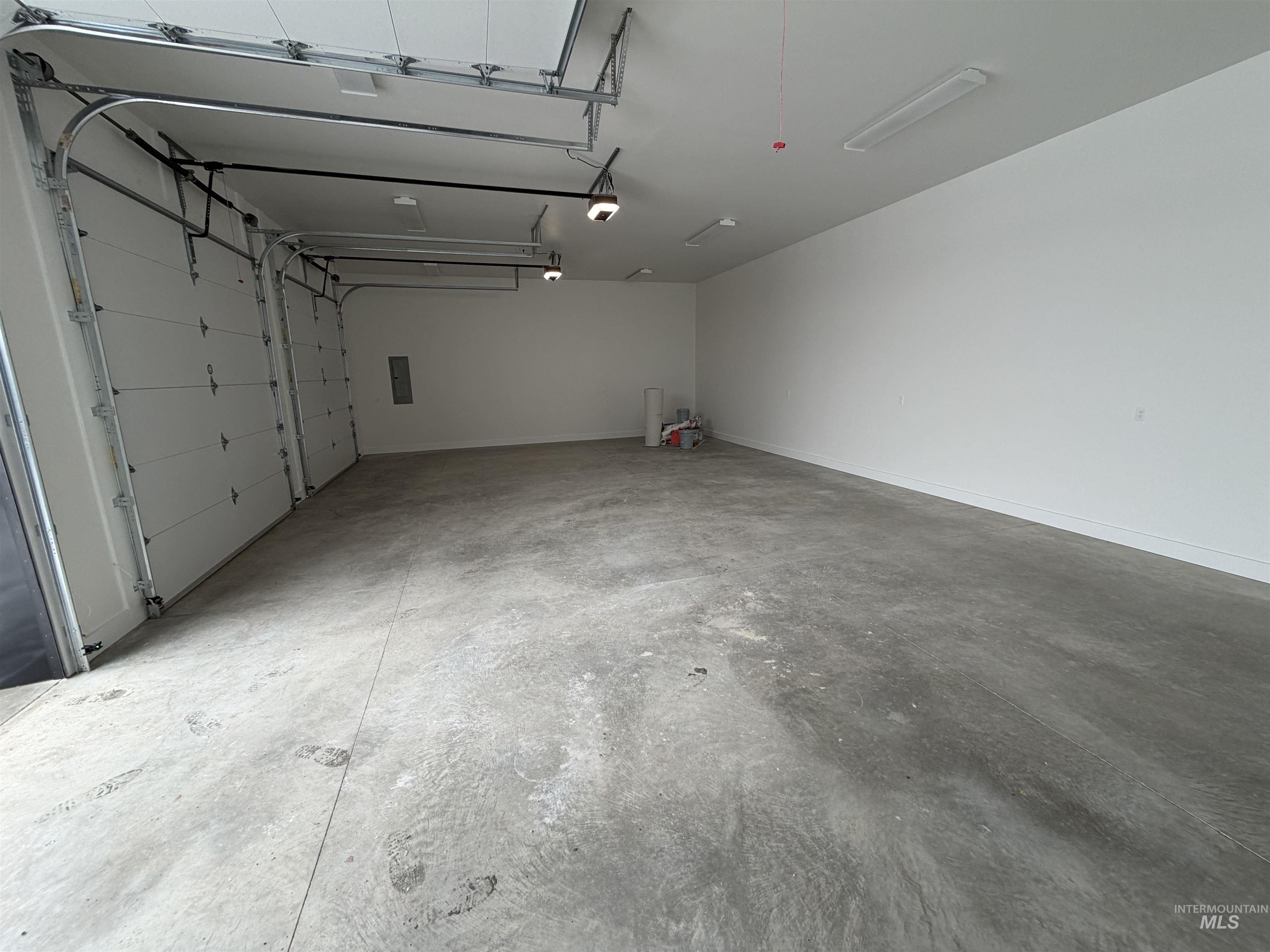 Garage featuring electric panel