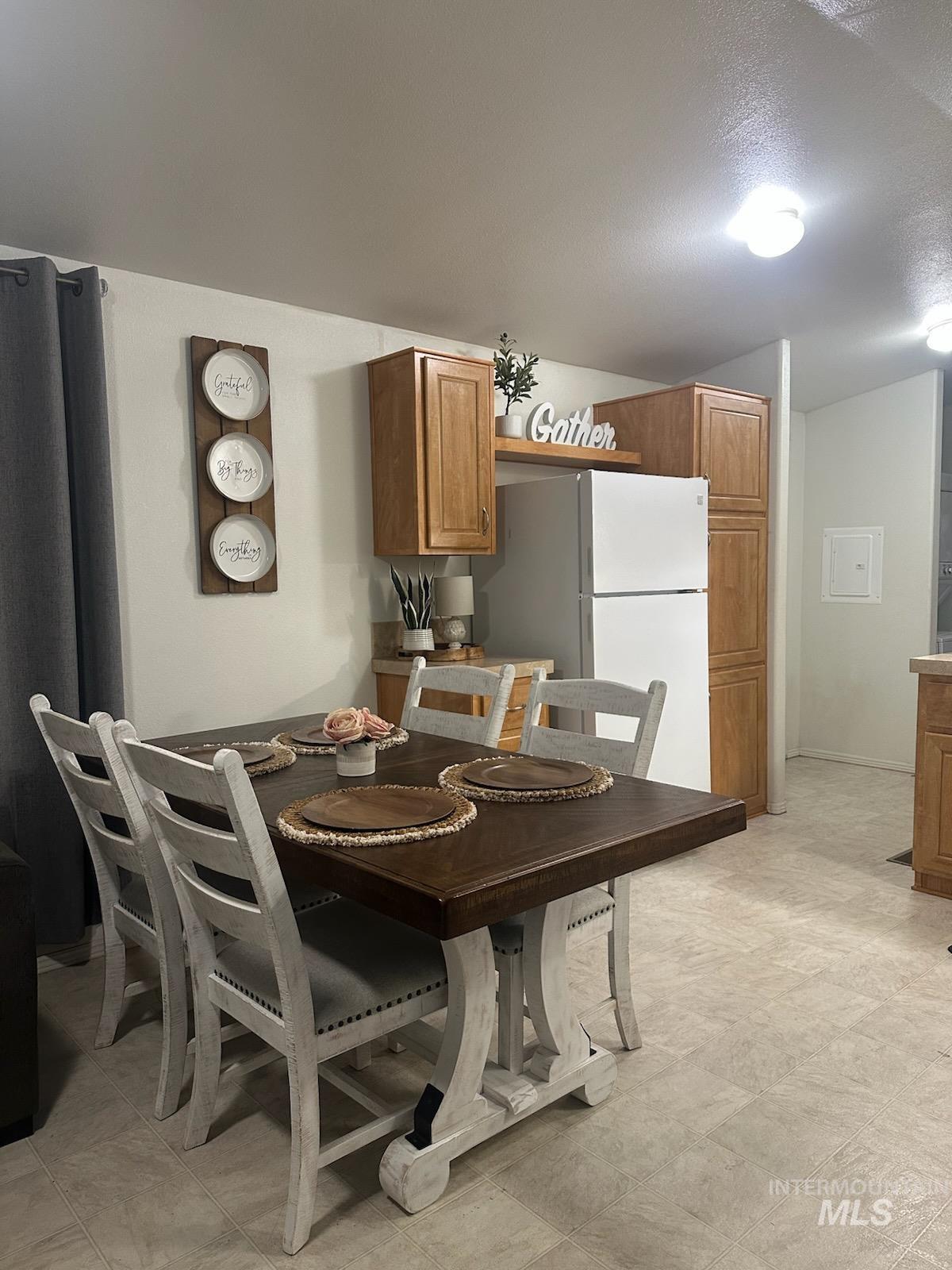 Dining area with a textured ceiling