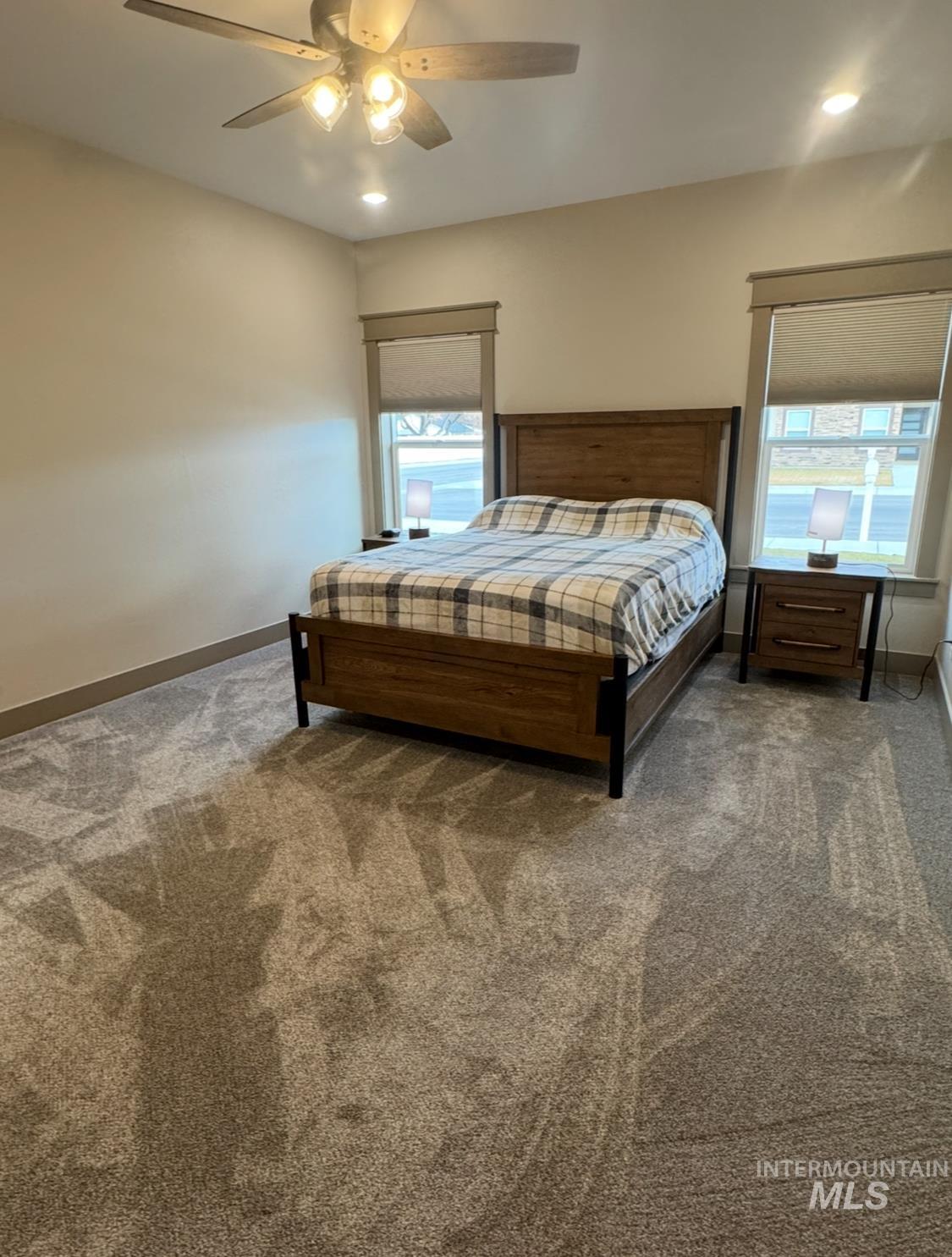 Bedroom featuring ceiling fan, carpet floors, and recessed lighting