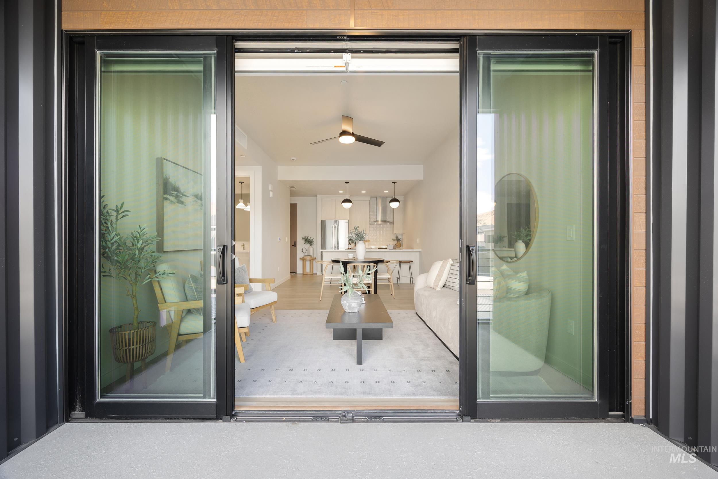 Property entrance featuring a balcony