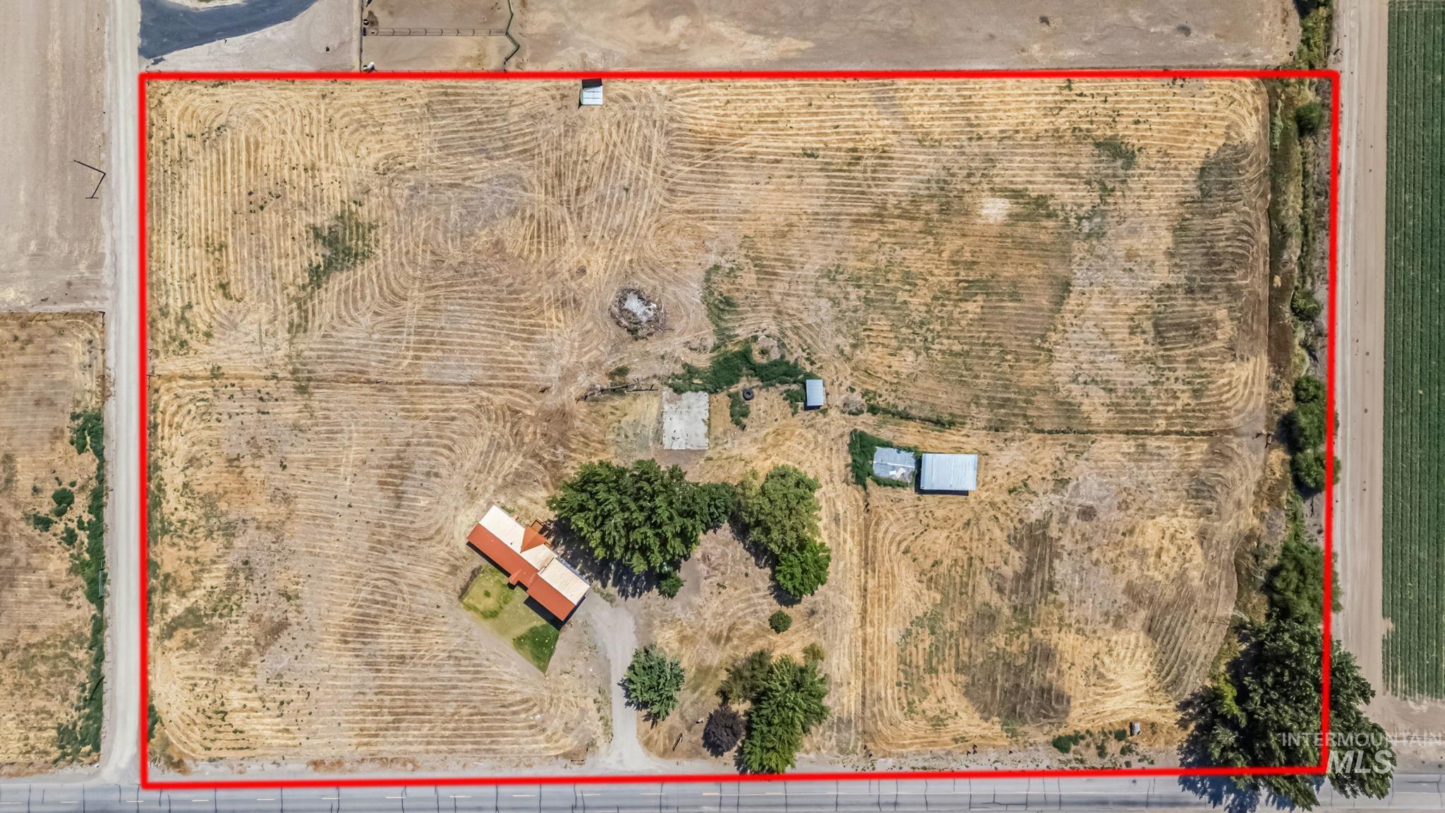 Overview of rural landscape featuring property parcel outlined