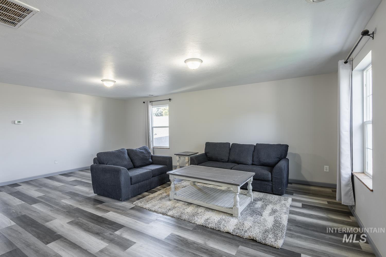 Living area featuring wood finished floors