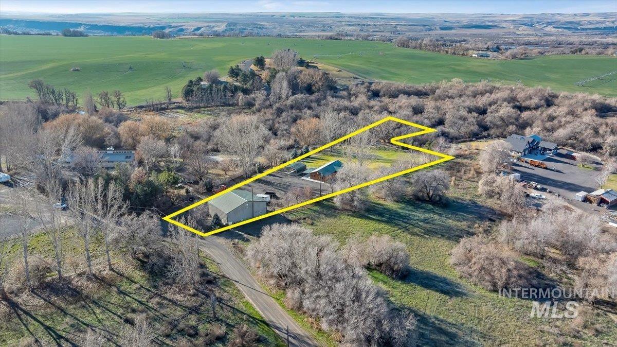 Aerial overview of property's location featuring property parcel outlined