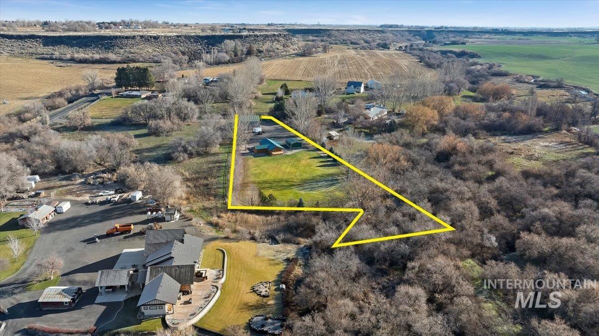 Overview of rural landscape featuring property parcel outlined