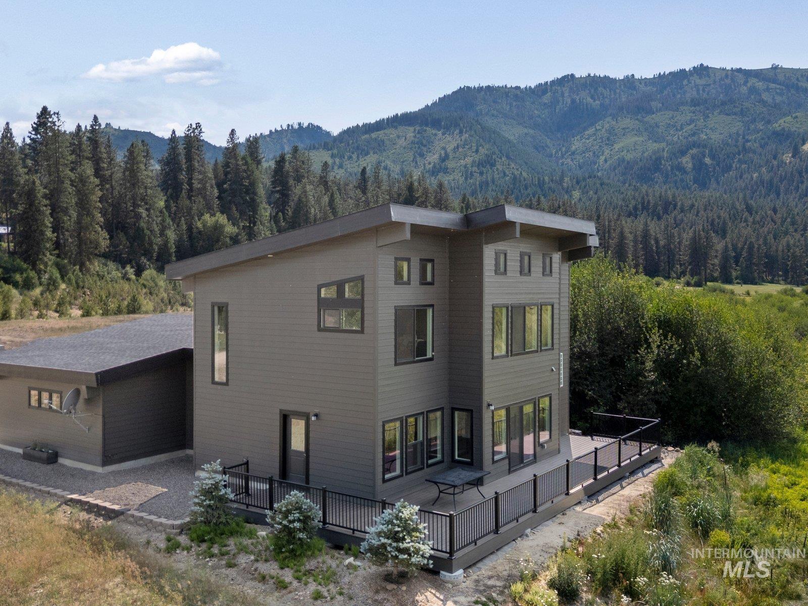 Exterior with 600 sf deck with mountain and valley views