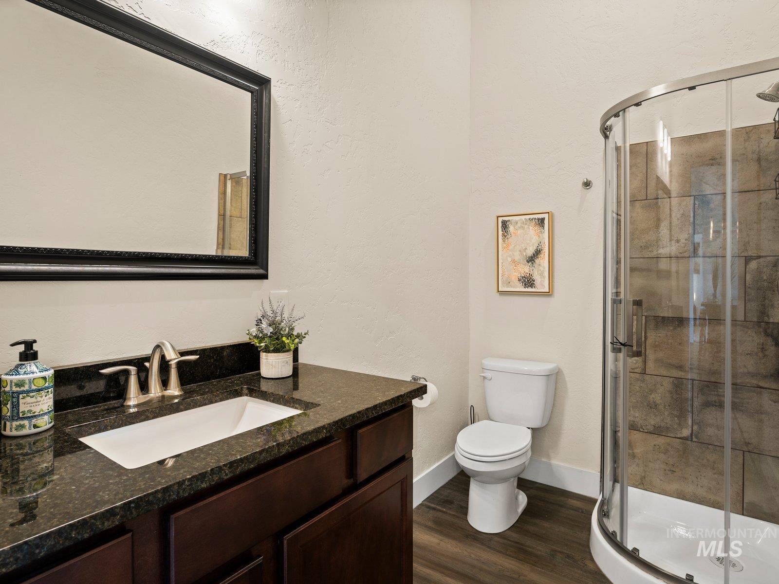 Full bath with a shower stall