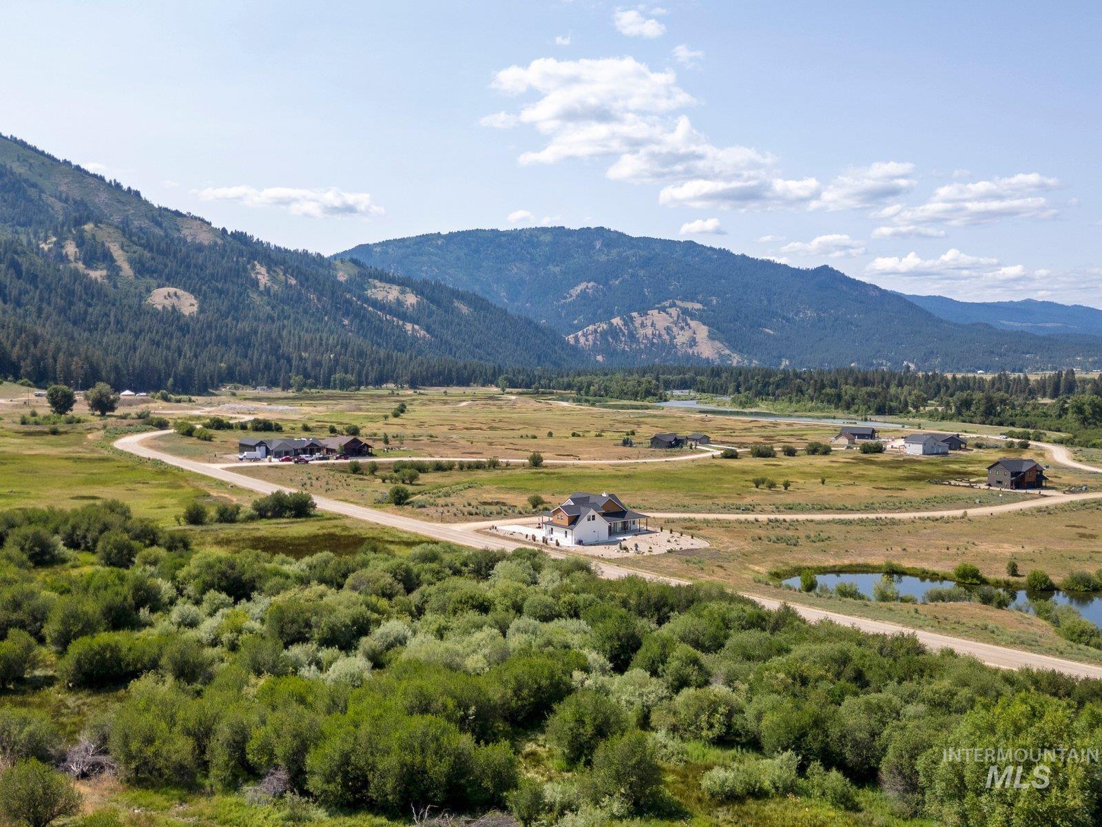 Views of mountains, community ponds, and South Fork of the Payette River