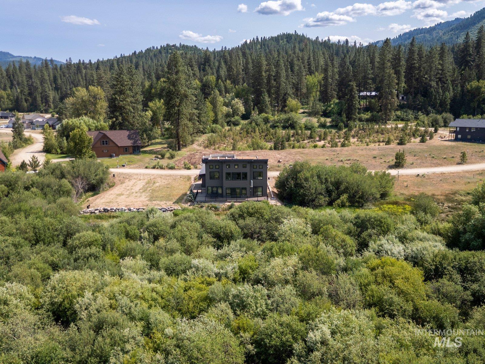 Aerial view of property and common area out back