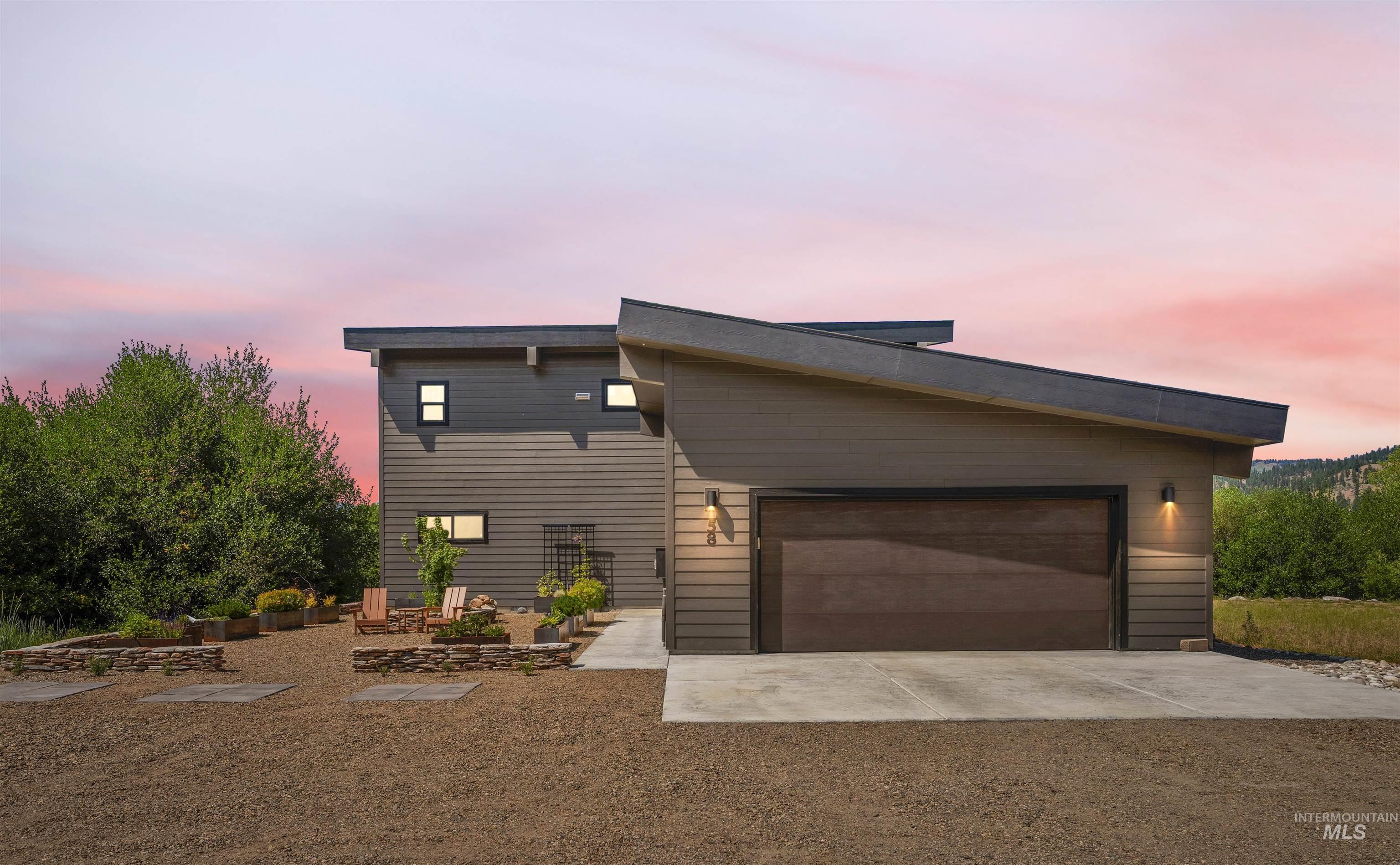 Sunset view of front of house