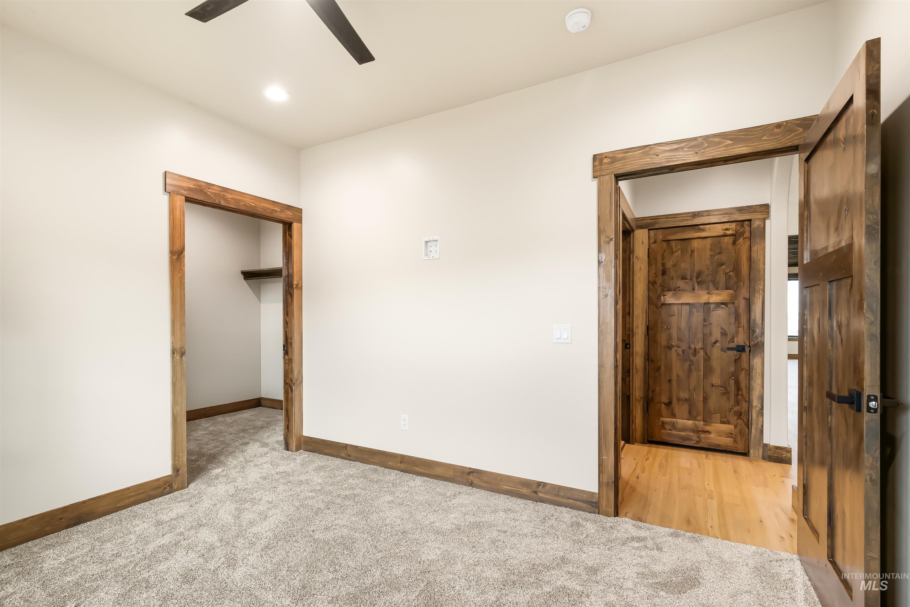 Main floor bedroom with walk-in closet.