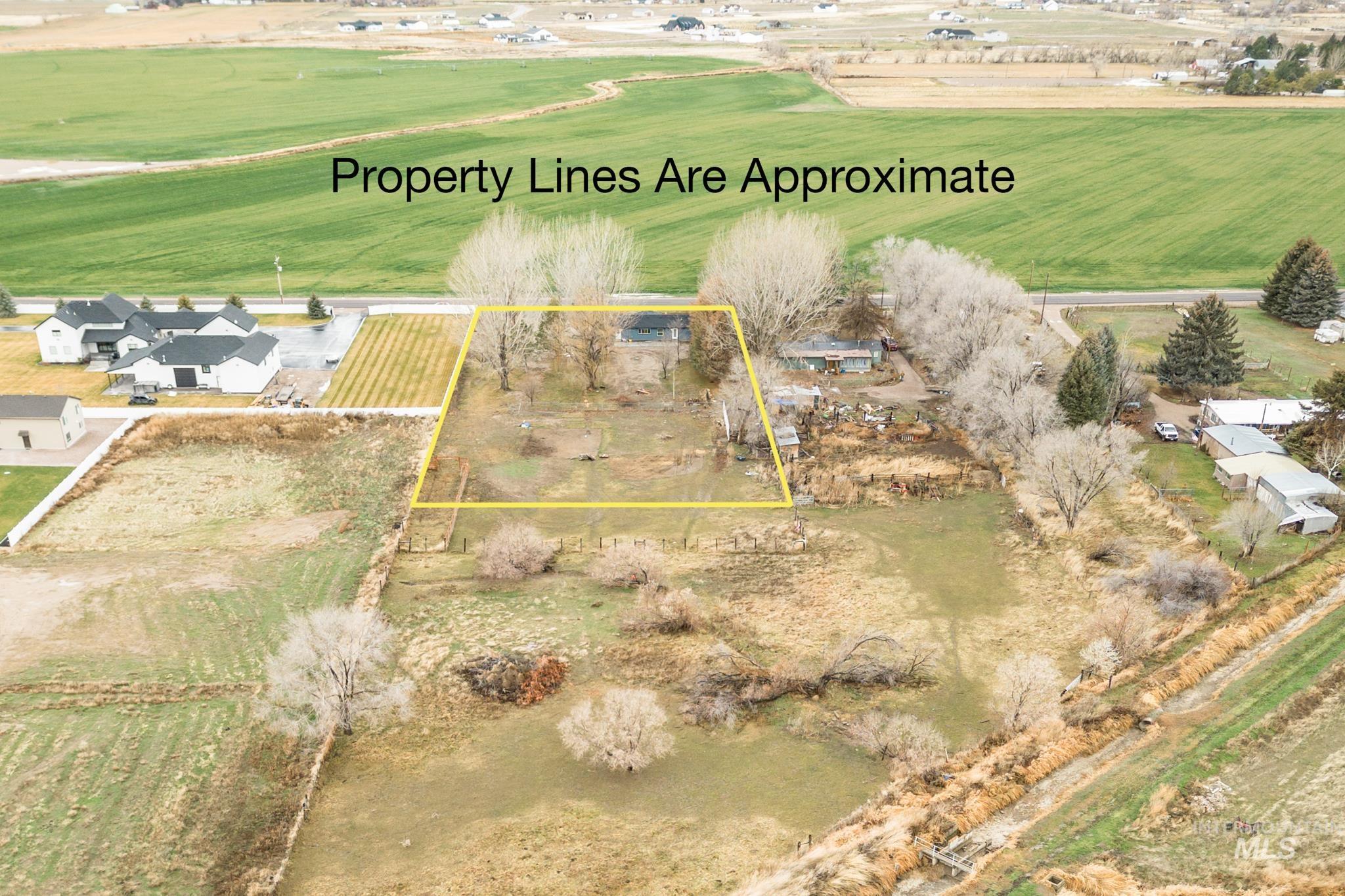 Overview of rural landscape featuring property boundaries highlighted