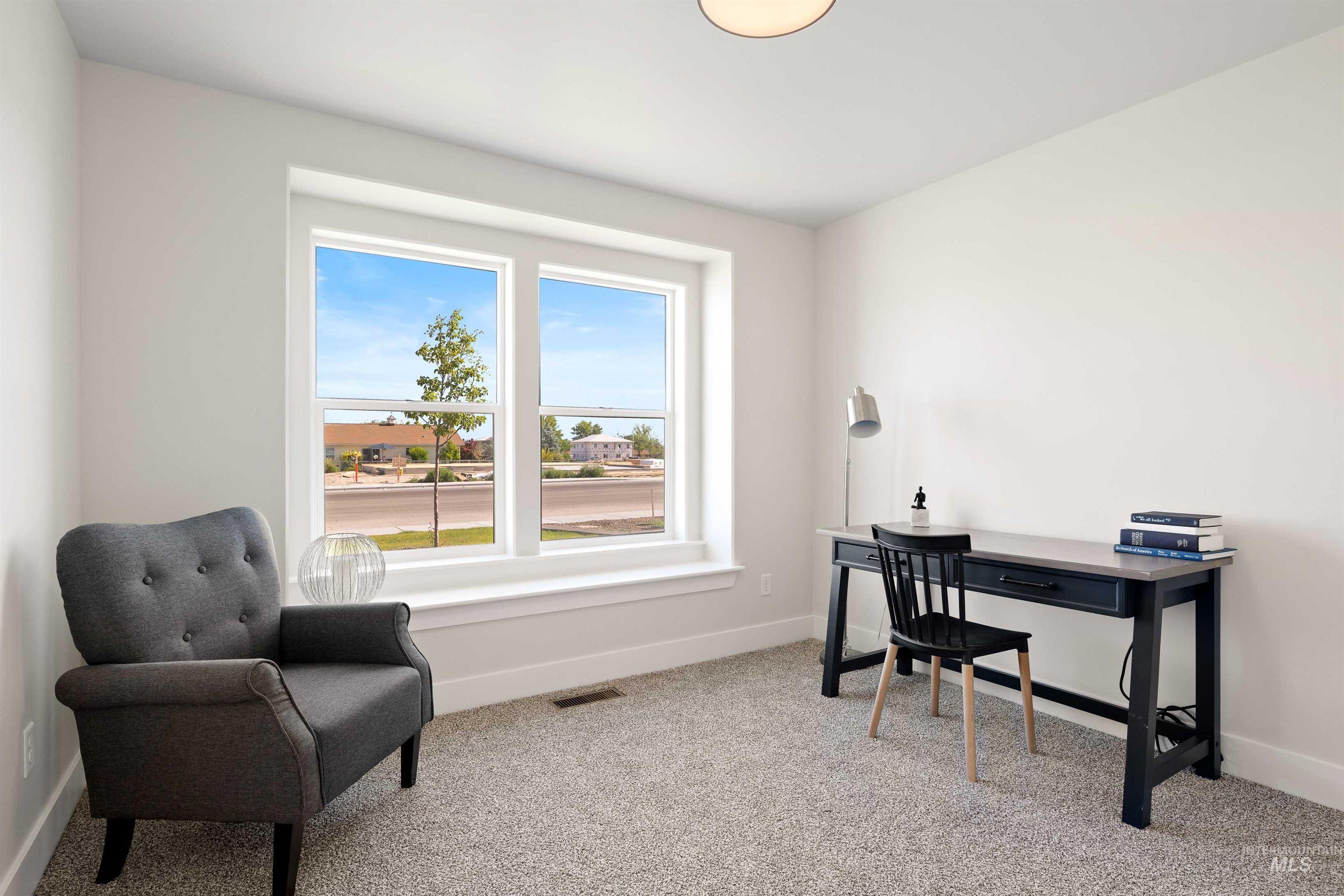 Office area with carpet floors and baseboards