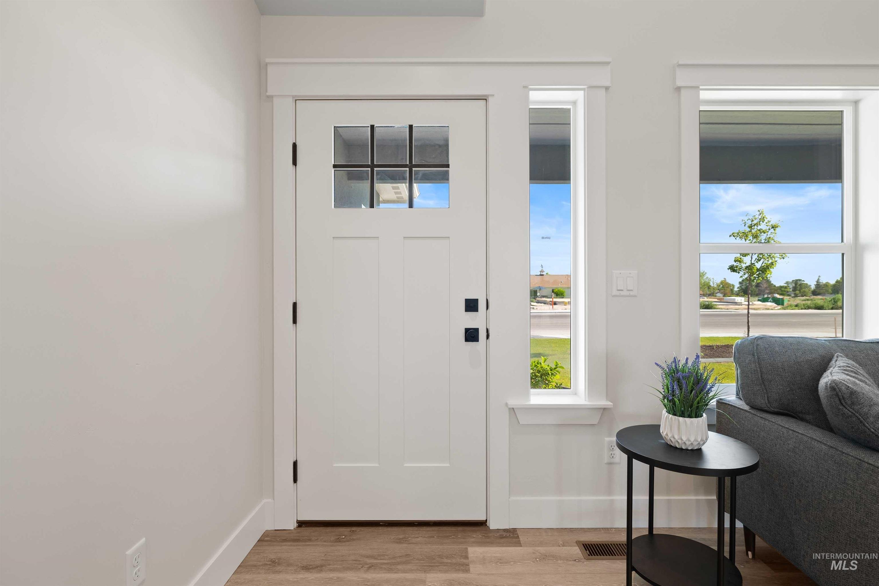 Foyer featuring light wood-type flooring