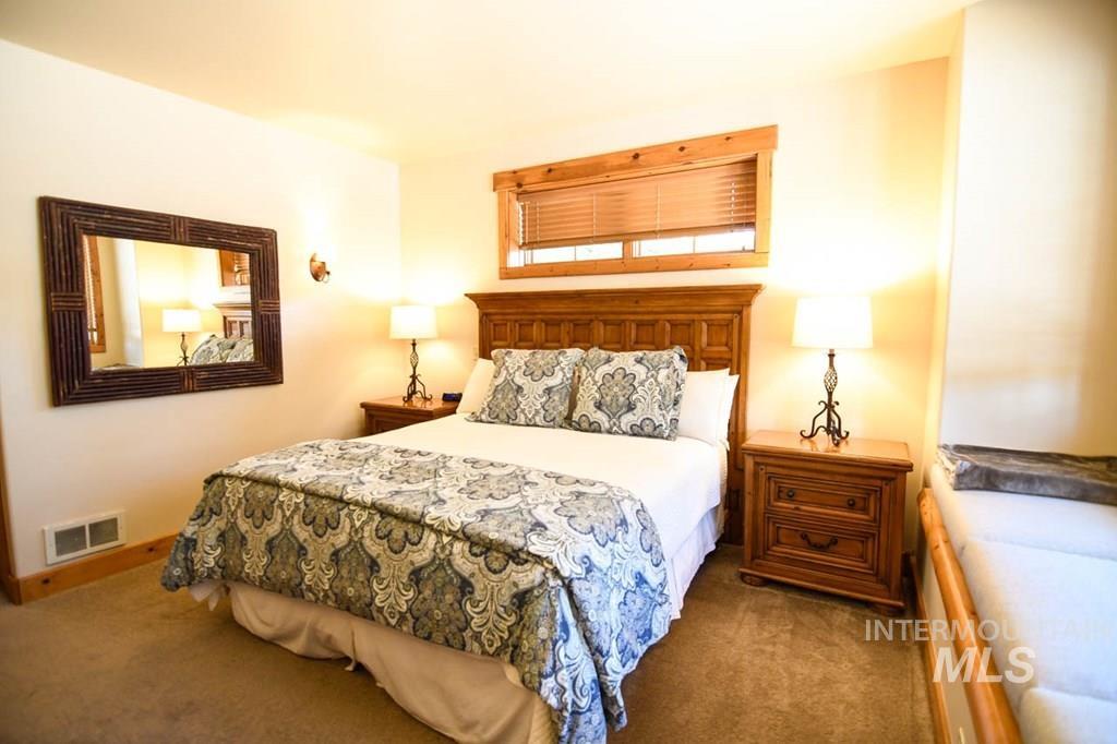 Bedroom featuring carpet floors