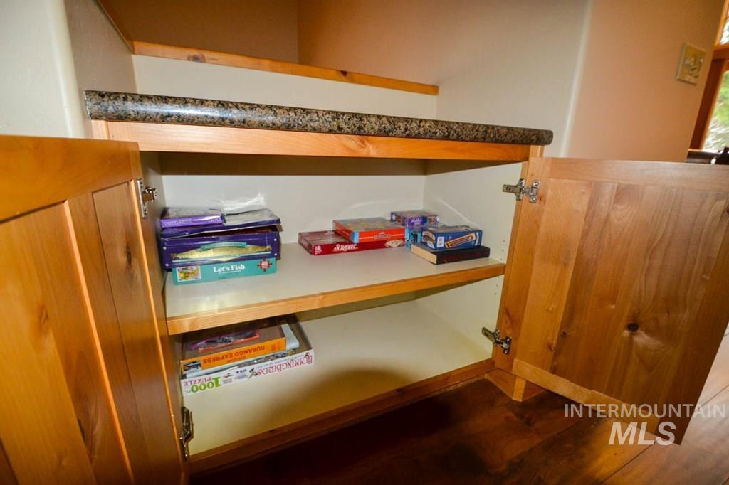 Detailed view of wood finished floors and baseboards