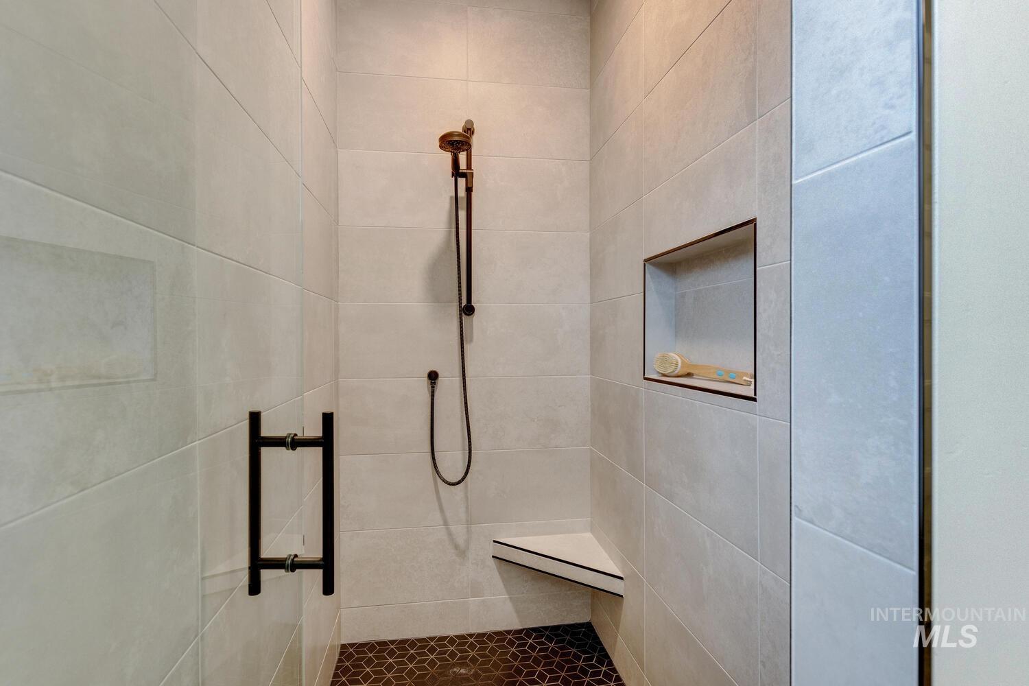 Full bath with tiled shower