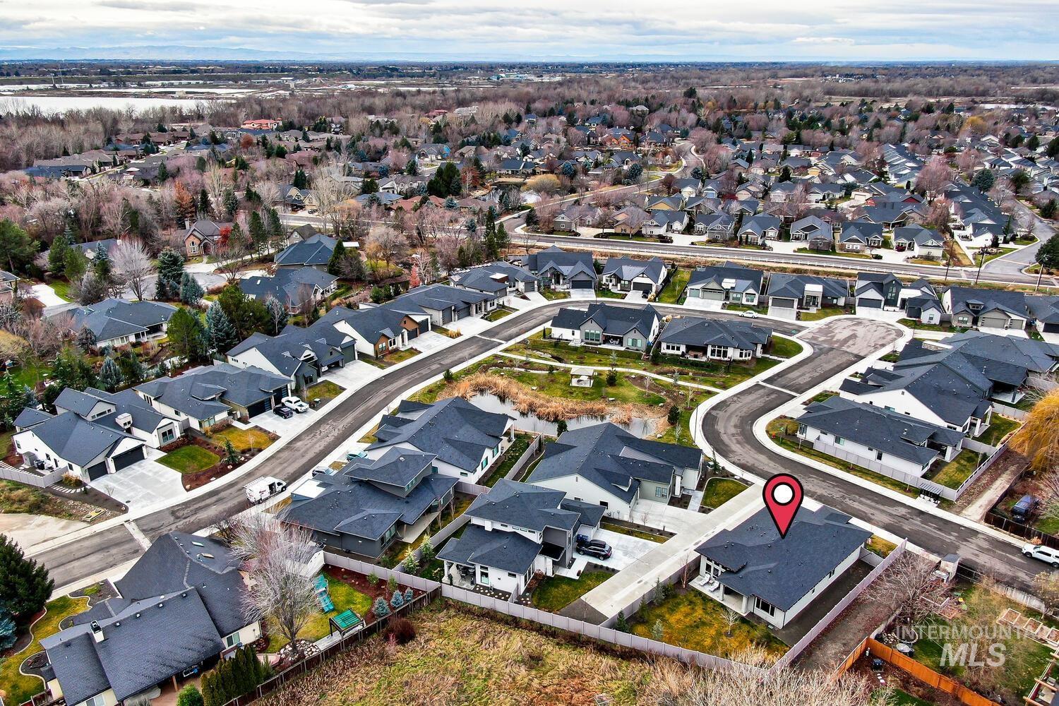 View of property location with nearby suburban area