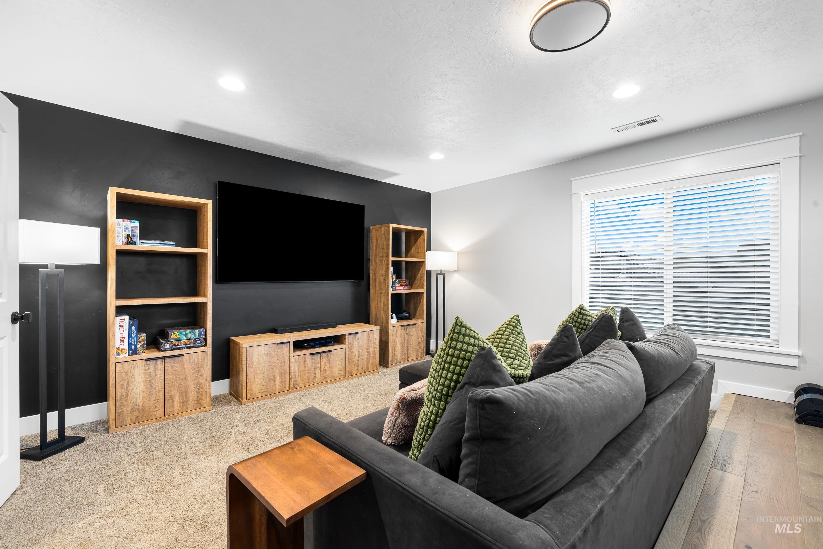 Living room featuring recessed lighting