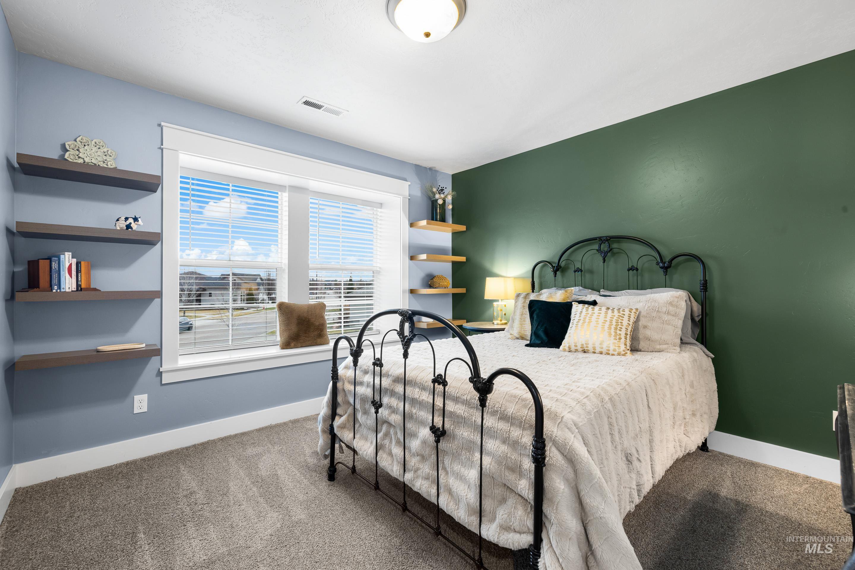 Bedroom with carpet flooring