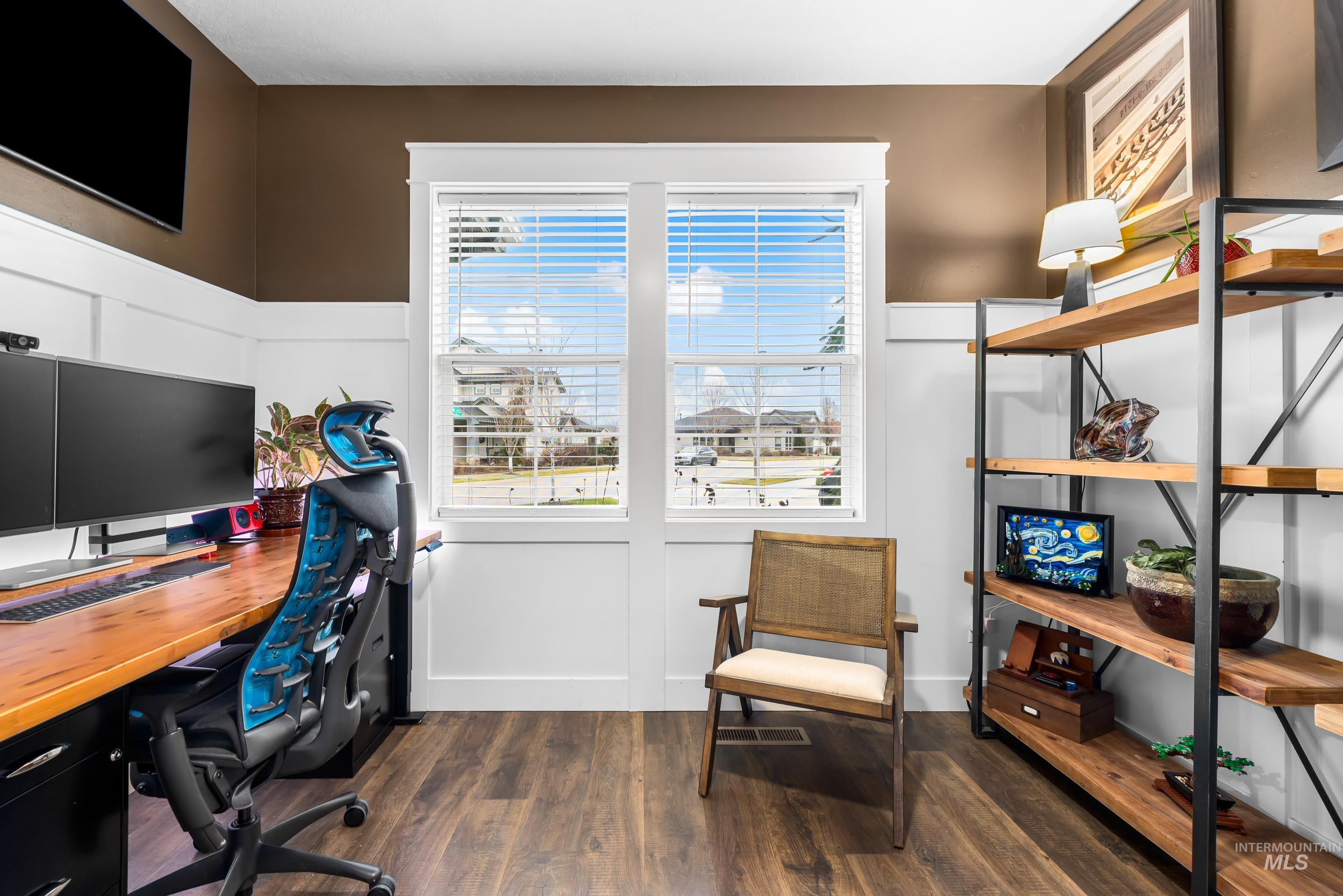 Office featuring dark wood-style floors