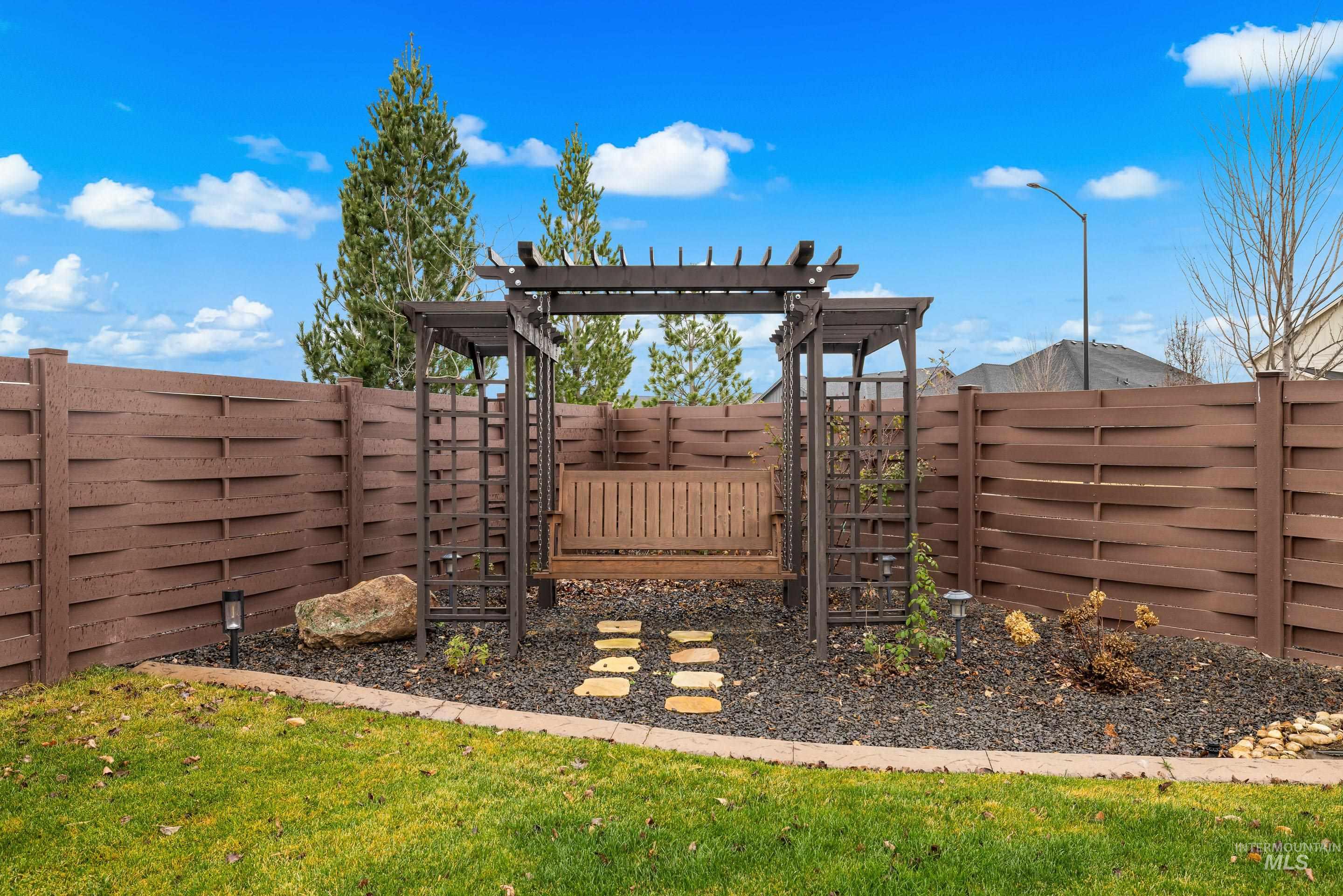 View of yard with a pergola