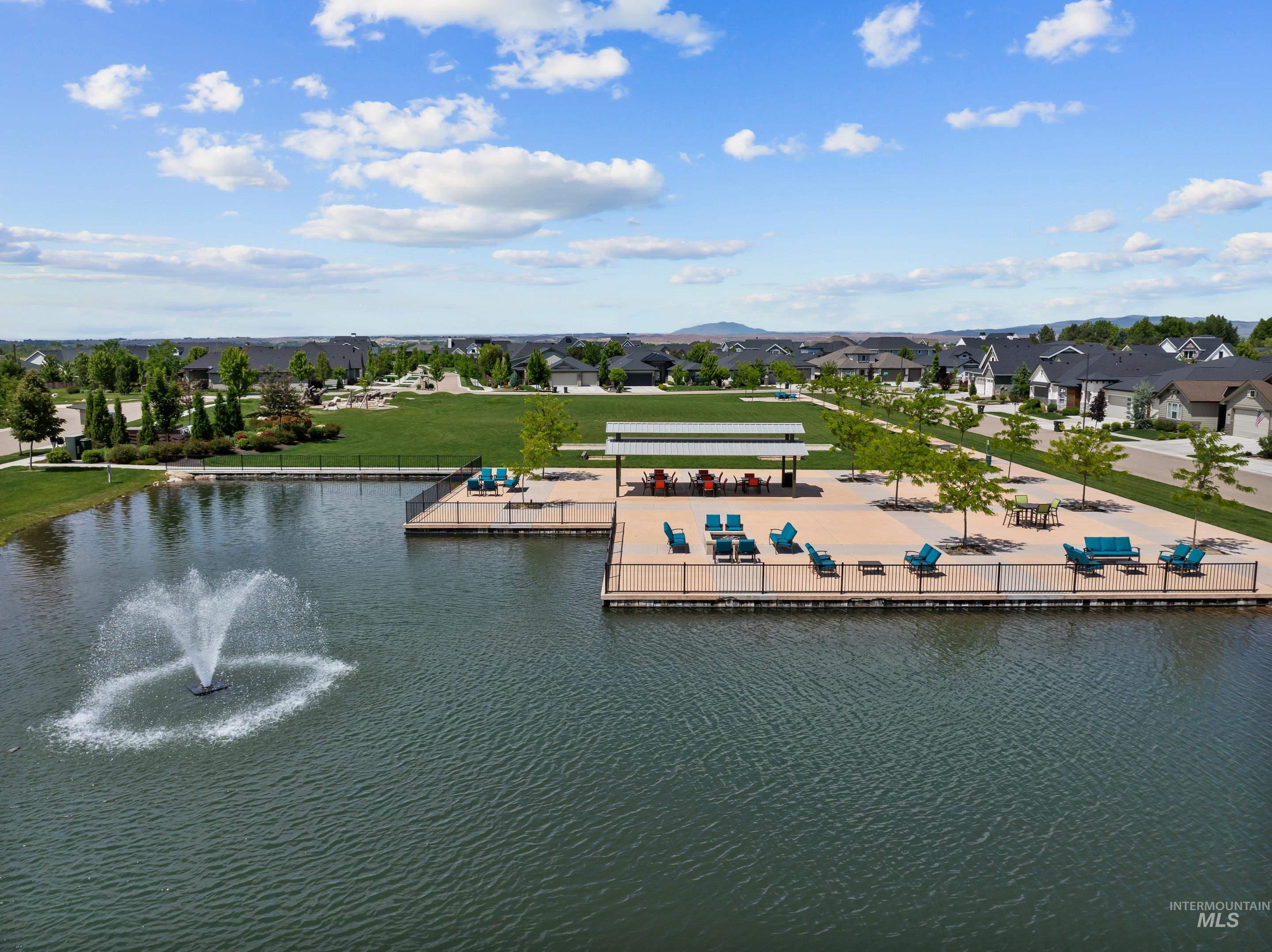 Aerial view of residential area with a nearby body of water