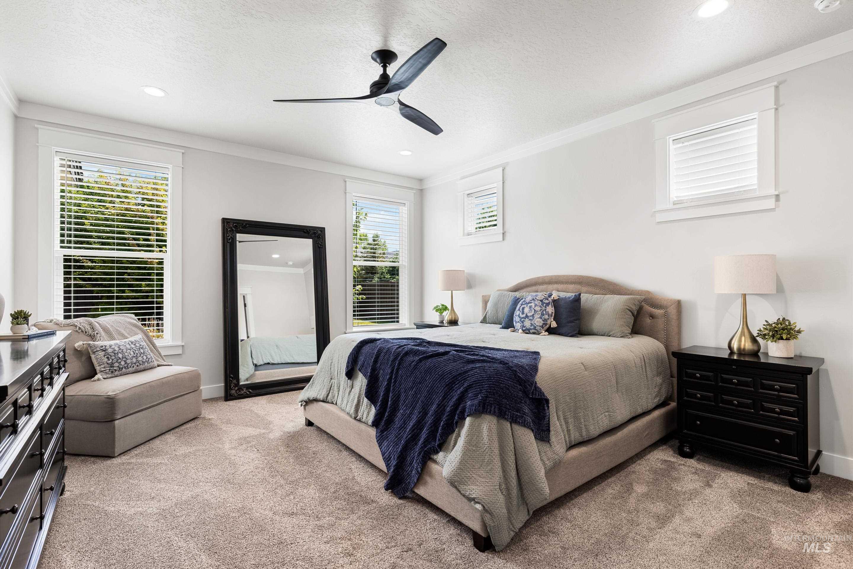 Bedroom featuring crown molding, light colored carpet, recessed lighting, and a ceiling fan