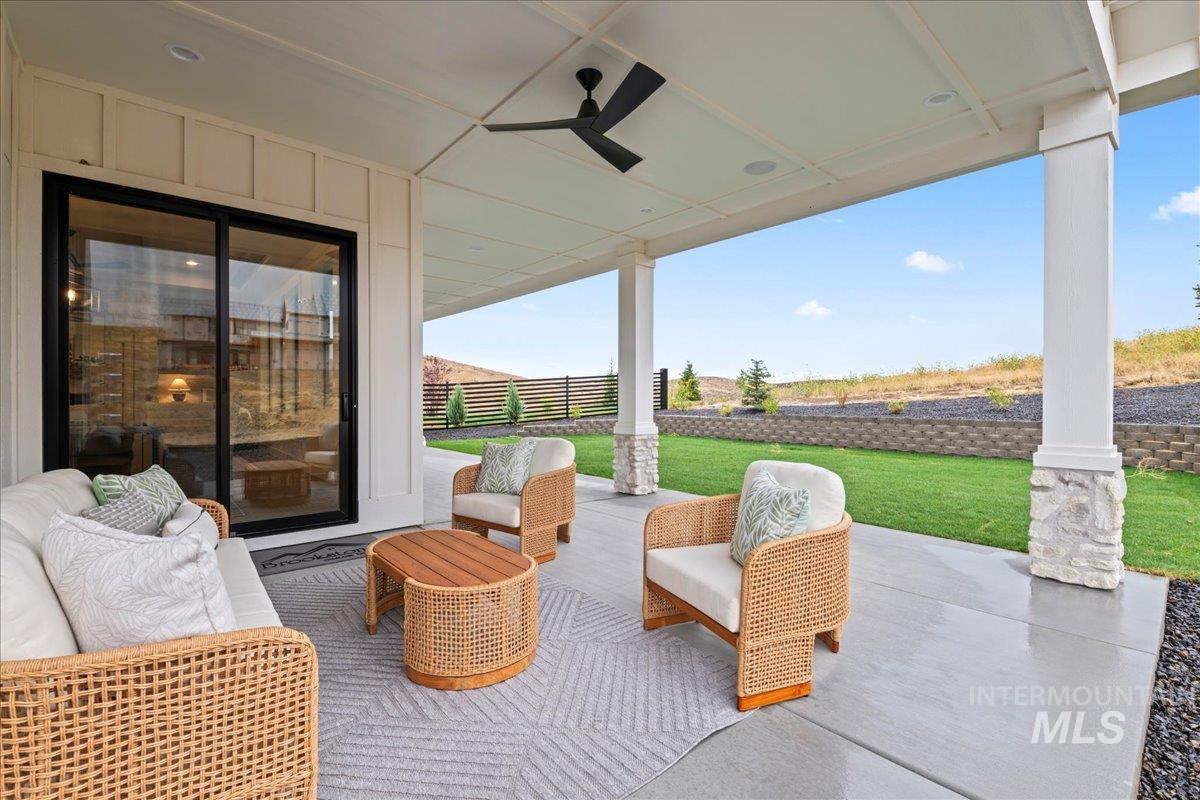 View of patio with ceiling fan
