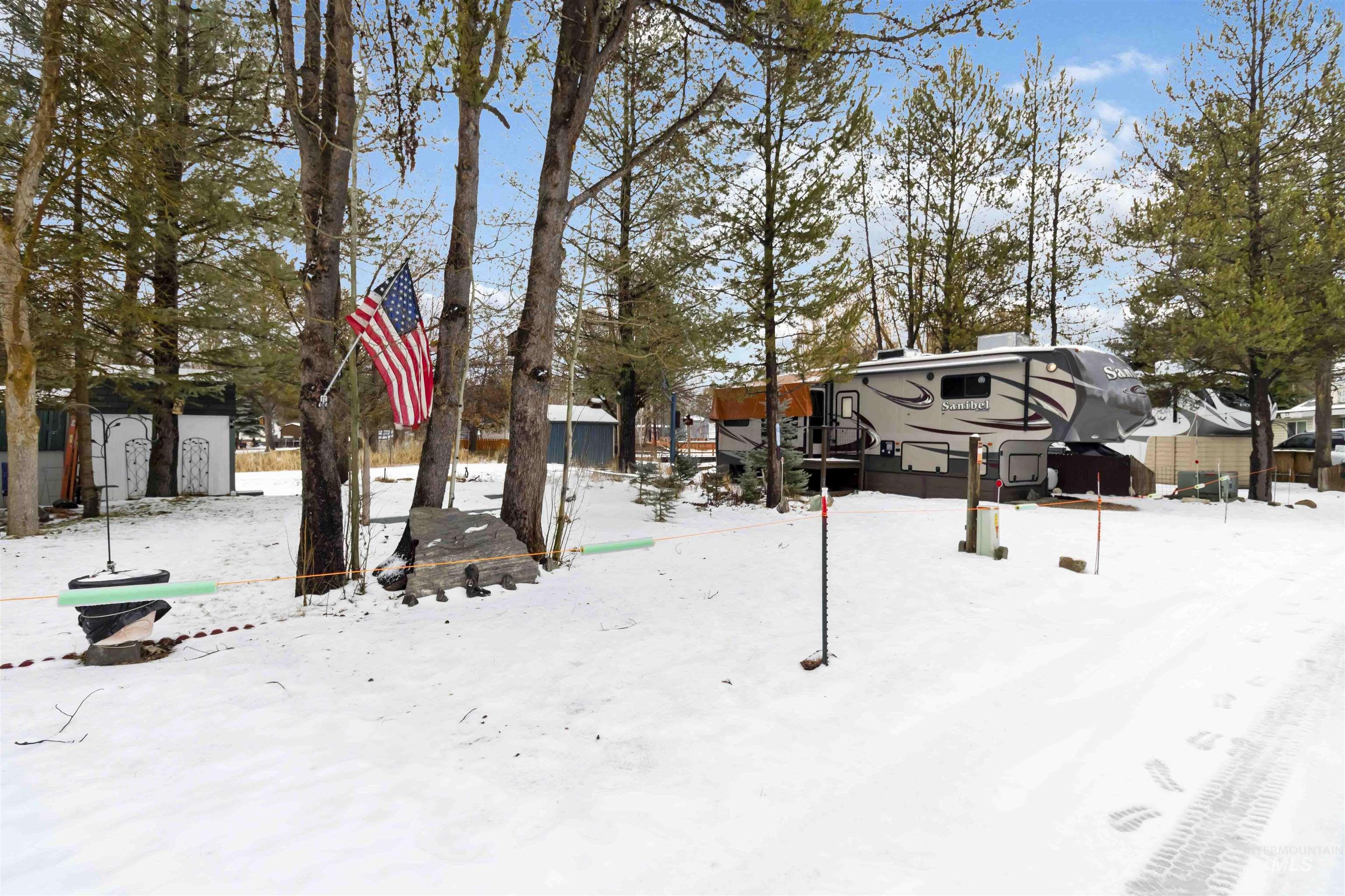View of yard covered in snow
