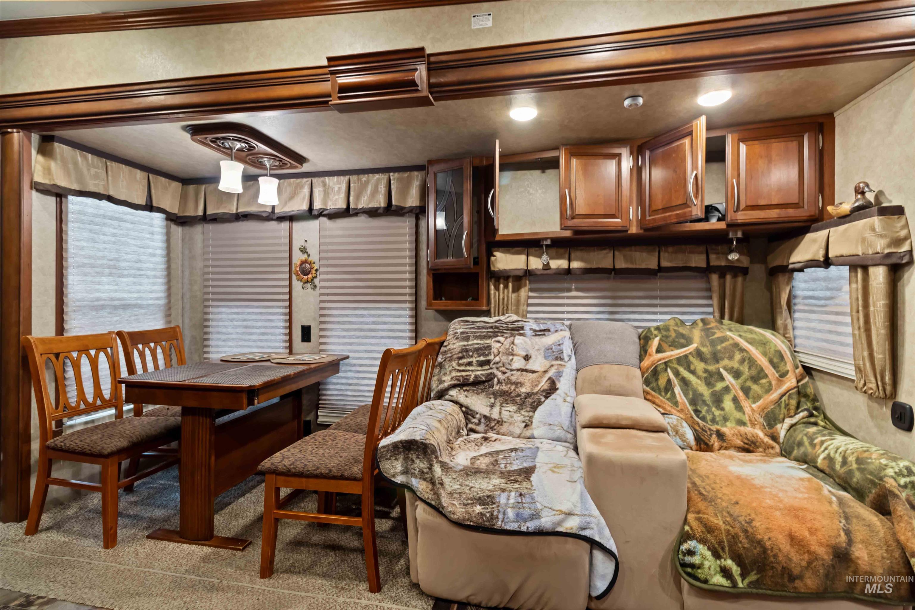 View of carpeted dining room