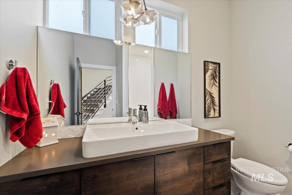 Bathroom featuring vanity and toilet