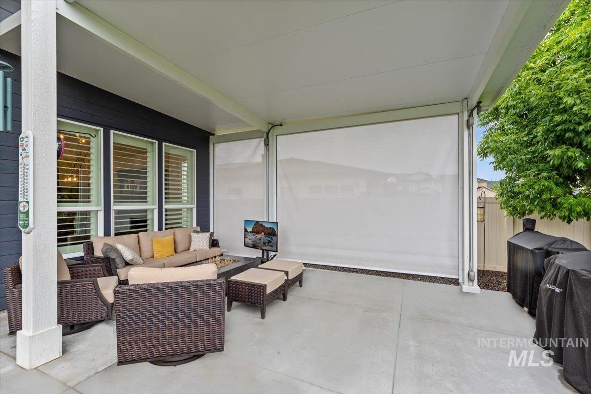 View of patio with an outdoor living space