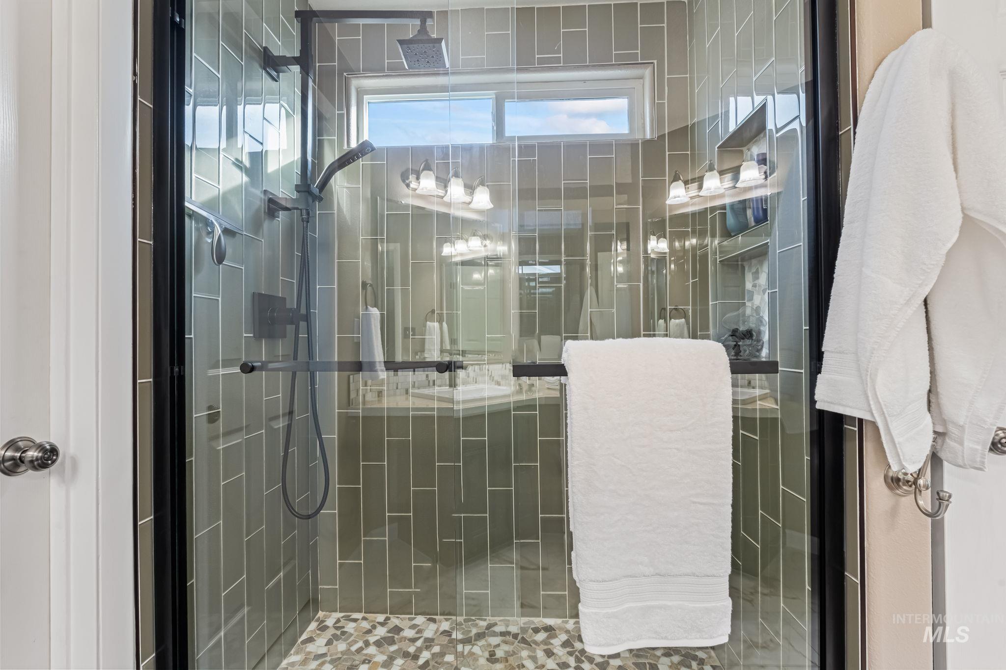 Bathroom featuring a stall shower