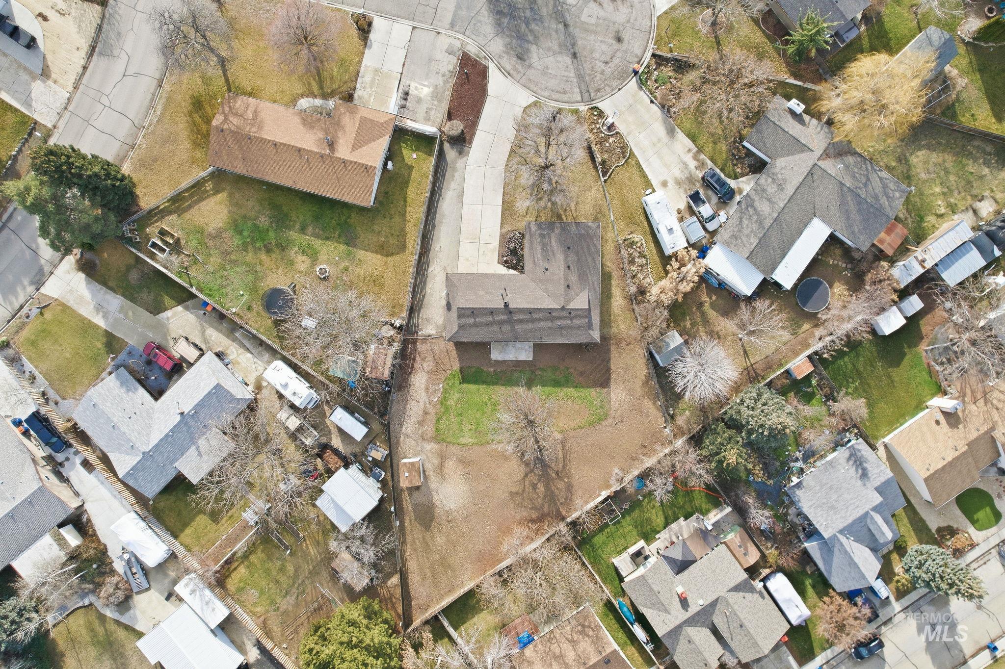 View of property location with nearby suburban area