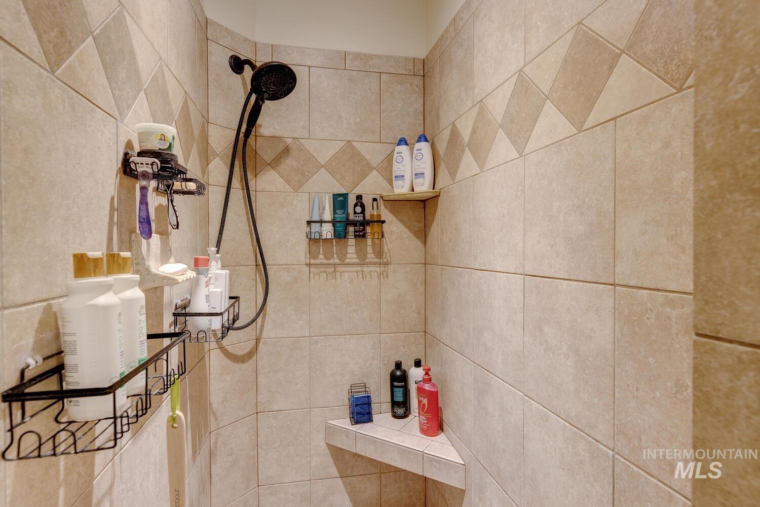 Bathroom view of tiled shower