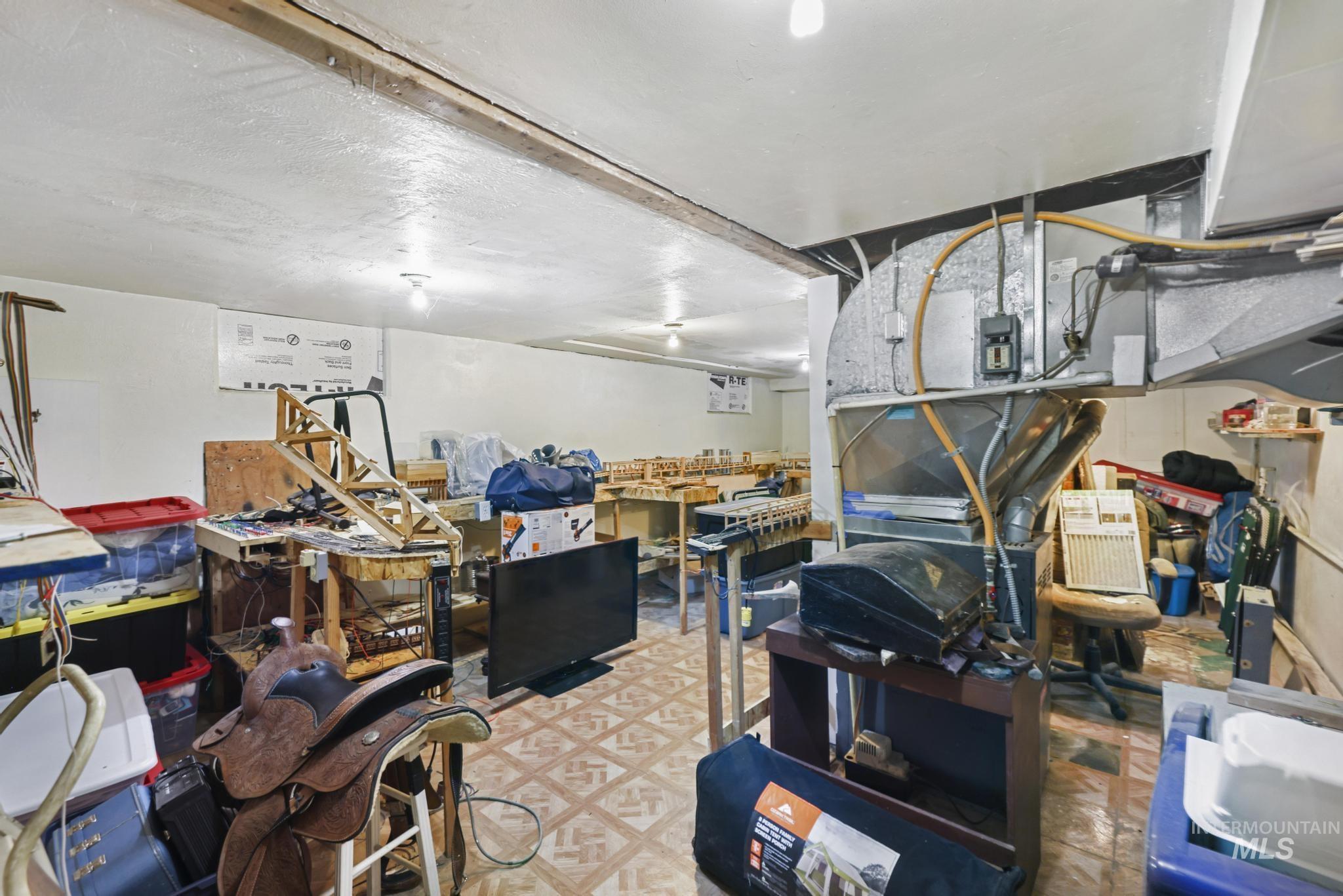 Misc room with light floors