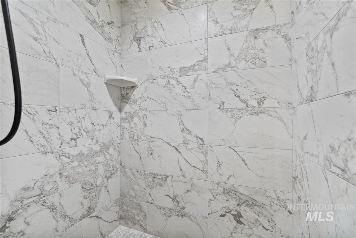 Bathroom view of tiled shower
