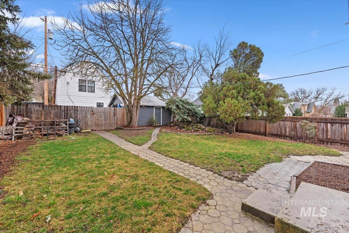 View of fenced backyard