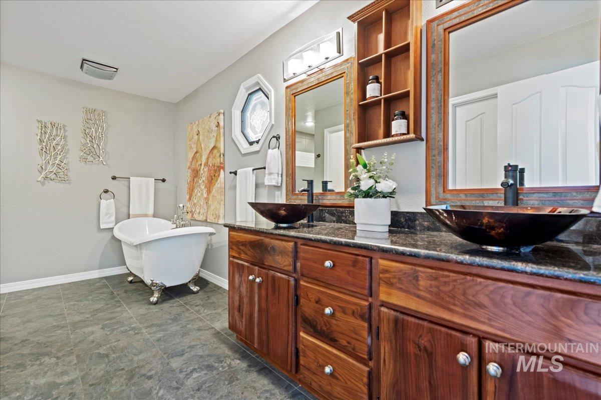 Full bath with a freestanding bath and double vanity