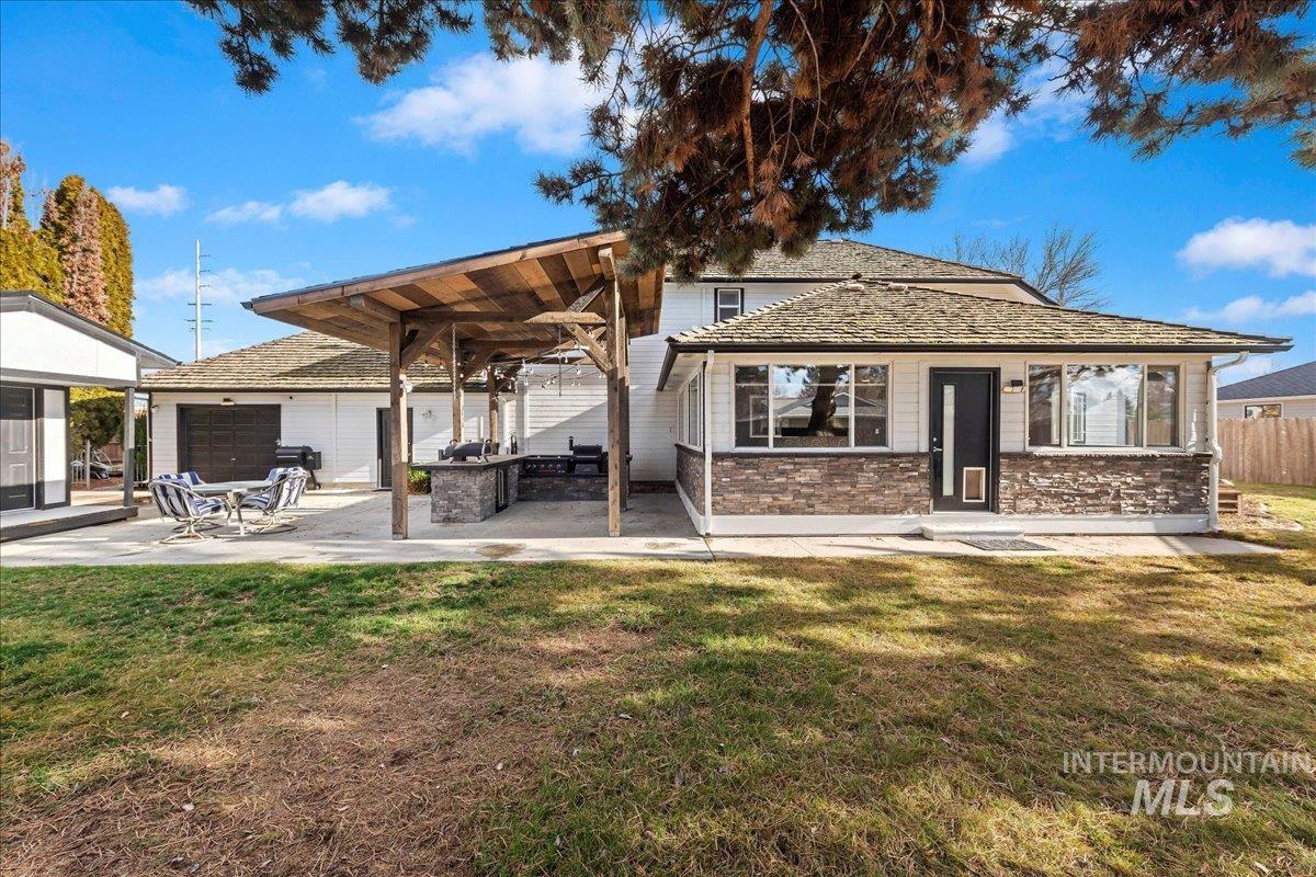 Back of house featuring a patio area
